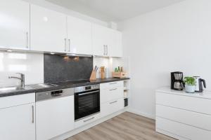Kuchyň nebo kuchyňský kout v ubytování Brenkenhagener Weg 4 Strandläufer