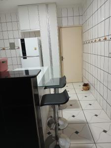 Kuchyň nebo kuchyňský kout v ubytování Casa próximo da Agrishow