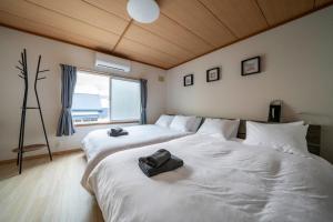 Postel nebo postele na pokoji v ubytování Vita