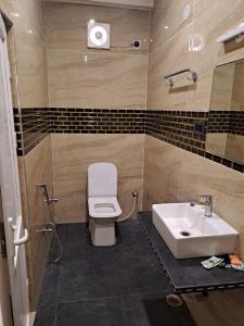 Koupelna v ubytování Hotel Vivek