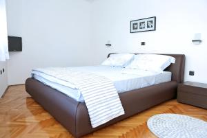 Giường trong phòng chung tại City Gallery Apartment