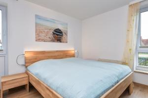 Postel nebo postele na pokoji v ubytování Lindenbuschen 2 Wohnung 2