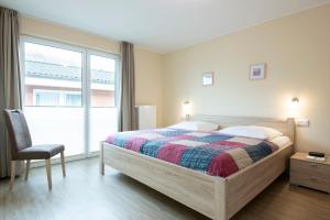 Postel nebo postele na pokoji v ubytování Waldstraße 16 Wohnung Eckhoff