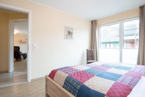 Postel nebo postele na pokoji v ubytování Waldstraße 16 Wohnung Eckhoff