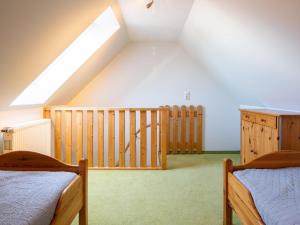 Postel nebo postele na pokoji v ubytování Haus Behrens Wohnung 1
