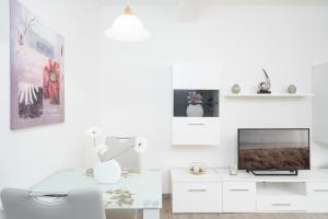 TV a/nebo společenská místnost v ubytování Haus Seebrise- Wohnung 7