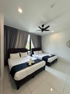 Letto o letti in una camera di TDOZE Hotel