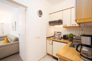 Kuchyň nebo kuchyňský kout v ubytování Haus Seebrise- Wohnung 7