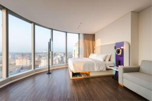 Voodi või voodid majutusasutuse Tru by Hilton Hanoi Station toas