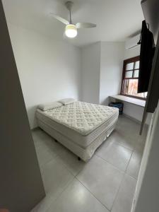 En eller flere senge i et værelse på Lar da Praia Casa4