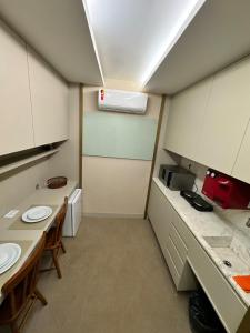 Køkken eller tekøkken på Espetacular - Flat no Jade Hotel Brasília