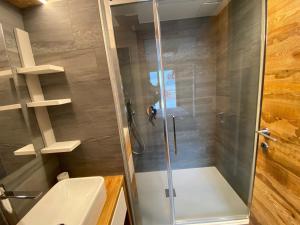 a bathroom with a shower and a sink at Duplex de luxe 96m² - Terrasse - Ski au pied - 9 Pers. - FR-1-445-221 in Montgenèvre +9 photos