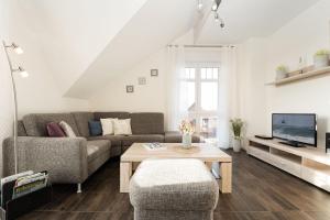 Μια τηλεόραση ή/και κέντρο ψυχαγωγίας στο Bürgermeister-Fox 42 Traumhaftes-Fehmarn