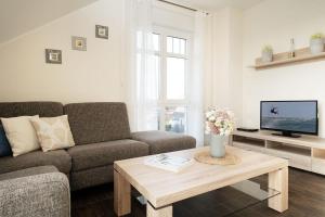 Μια τηλεόραση ή/και κέντρο ψυχαγωγίας στο Bürgermeister-Fox 42 Traumhaftes-Fehmarn