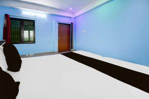 Postel nebo postele na pokoji v ubytování HOTEL O AMANTRAN