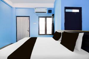 Postel nebo postele na pokoji v ubytování HOTEL O AMANTRAN
