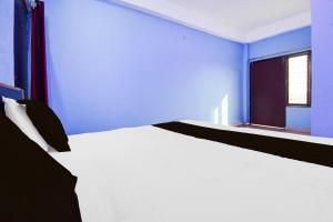 Postel nebo postele na pokoji v ubytování HOTEL O AMANTRAN
