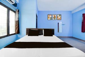 Postel nebo postele na pokoji v ubytování HOTEL O AMANTRAN