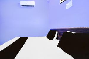 Postel nebo postele na pokoji v ubytování HOTEL O AMANTRAN
