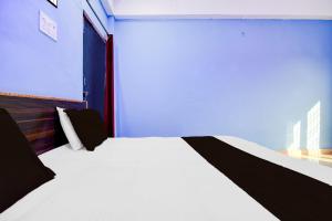 Postel nebo postele na pokoji v ubytování HOTEL O AMANTRAN