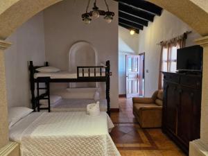 Katil atau katil-katil dalam bilik di Beautiful Colonial Casita Quetzalli