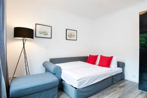 Postel nebo postele na pokoji v ubytování Rosenstraße 1a Bootshaus