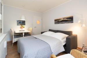Postel nebo postele na pokoji v ubytování Solymar Wohnung 22