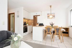 Η κουζίνα ή μικρή κουζίνα στο Haus Titania Wohnung 12