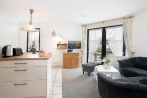 Μια τηλεόραση ή/και κέντρο ψυχαγωγίας στο Haus Titania Wohnung 12