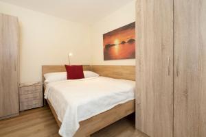 Postel nebo postele na pokoji v ubytování Lindenbuschen 2 Wohnung 6