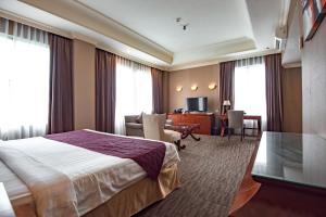 TV o dispositivi per l'intrattenimento presso The Mirah Hotel Bogor