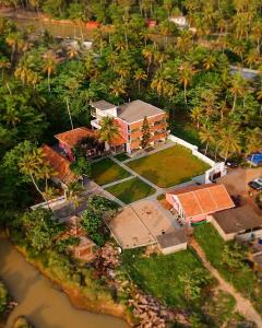 Fotografie z fotogalerie ubytování Beach House Varkala by Palmyra v destinaci Varkala