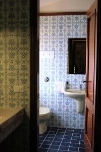Koupelna v ubytování Relais Villa Borghetto
