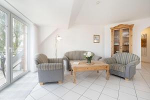 Posezení v ubytování Strandresidenz Wohnung 7
