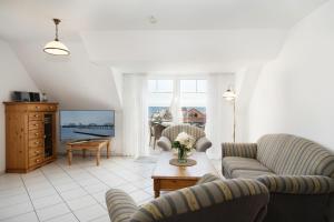 Posezení v ubytování Strandresidenz Wohnung 7
