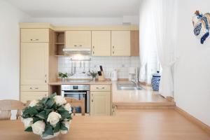 Kuchyň nebo kuchyňský kout v ubytování Strandresidenz Wohnung 7