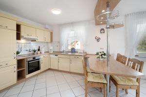 Kuchyň nebo kuchyňský kout v ubytování Strandresidenz Wohnung 7