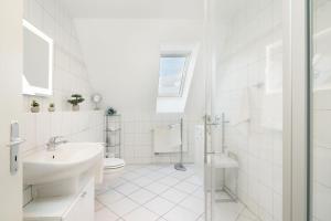 Koupelna v ubytování Strandresidenz Wohnung 7