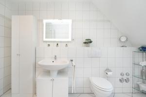Koupelna v ubytování Strandresidenz Wohnung 7
