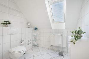 Koupelna v ubytování Strandresidenz Wohnung 7