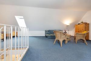 Posezení v ubytování Strandresidenz Wohnung 7