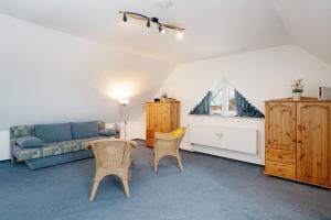Posezení v ubytování Strandresidenz Wohnung 7