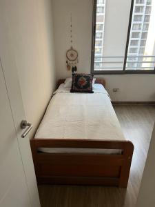 Postel nebo postele na pokoji v ubytování Gran depto en Barrio Italia - Condell