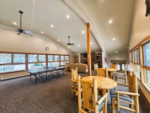 a room with a table and chairs and a couch at Cartwright Corner Condo townhouse in Incline Village