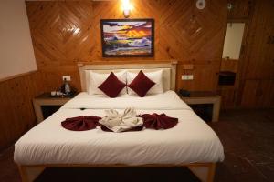 Voodi või voodid majutusasutuse Hotel Monal toas