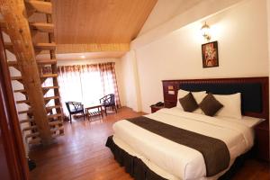 Voodi või voodid majutusasutuse Hotel Monal toas