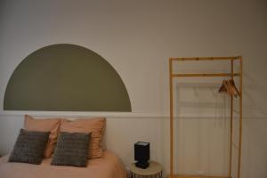 Postel nebo postele na pokoji v ubytování Appartement Ô Arcades