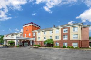 an office building with a parking lot in front of it at Comfort Suites in French Lick