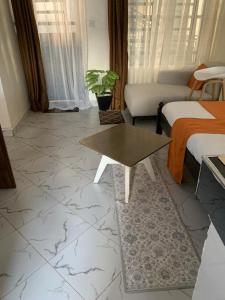 Posezení v ubytování J and L hosting- Lower Kabete rd