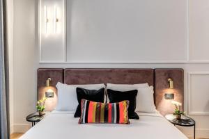 Residenza Piranesi Boutique Hotel客房内的一张或多张床位